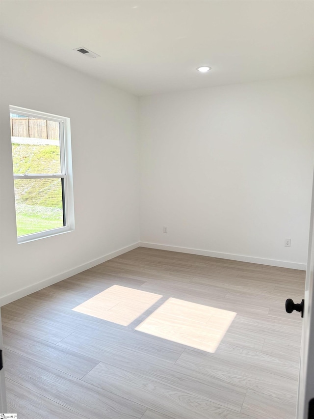 1221 Humphries Rd, Cowpens, SC 29330 - spare room featuring baseboards, light wood-type flooring, and recessed lighting