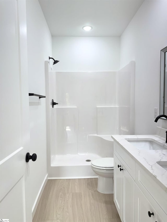1221 Humphries Rd, Cowpens, SC 29330 - bathroom featuring toilet, a shower, double vanity, and baseboards