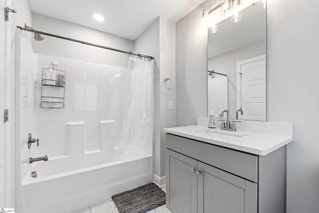 full bath with vanity and shower / tub combo
