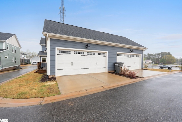garage with driveway