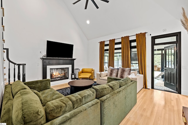 3 Bailey Knoll Ct, Simpsonville, SC 29681 - living room with high vaulted ceiling, light wood finished floors, ceiling fan, recessed lighting, and a glass covered fireplace