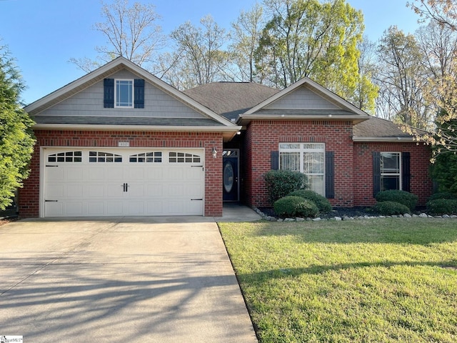 410 Airdale Ln, Simpsonville, SC 29680 - view of front facade featuring a front yard, concrete driveway, brick siding, a shingled roof, and a garage