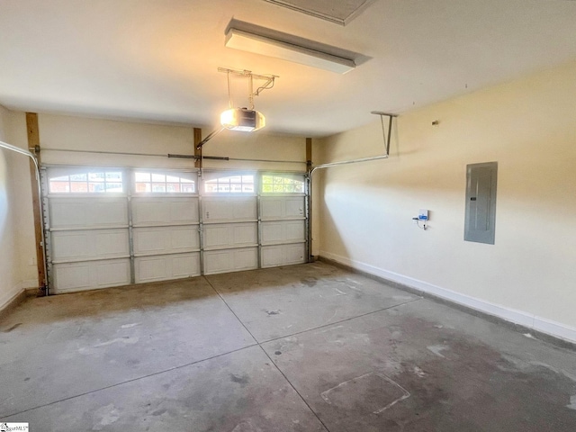 410 Airdale Ln, Simpsonville, SC 29680 - garage with baseboards, a garage door opener, and electric panel