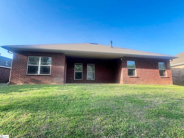 410 Airdale Ln, Simpsonville, SC 29680 - view of front of home with brick siding, roof with shingles, and a front yard