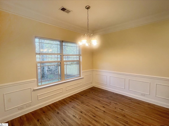 410 Airdale Ln, Simpsonville, SC 29680 - unfurnished dining area featuring dark wood-style flooring, visible vents, a chandelier, crown molding, and wainscoting