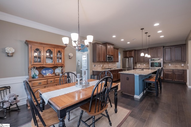 313 Rosendale Way, Simpsonville, SC 29681 - dining area featuring dark wood-style floors, a notable chandelier, and ornamental molding