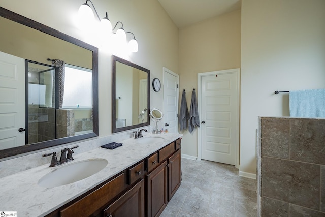 313 Rosendale Way, Simpsonville, SC 29681 - full bath with tiled shower, double vanity, baseboards, and a sink