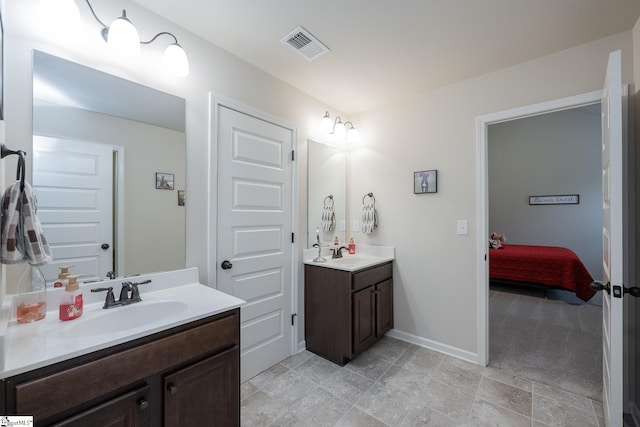 313 Rosendale Way, Simpsonville, SC 29681 - bathroom with a sink, visible vents, two vanities, and baseboards