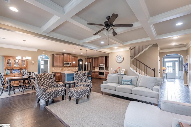 313 Rosendale Way, Simpsonville, SC 29681 - living area with arched walkways, stairs, ornamental molding, and coffered ceiling