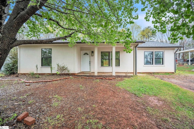 view of front of home featuring stucco siding