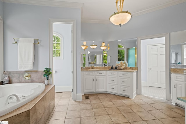 full bath with a tub with jets, tile patterned floors, and crown molding