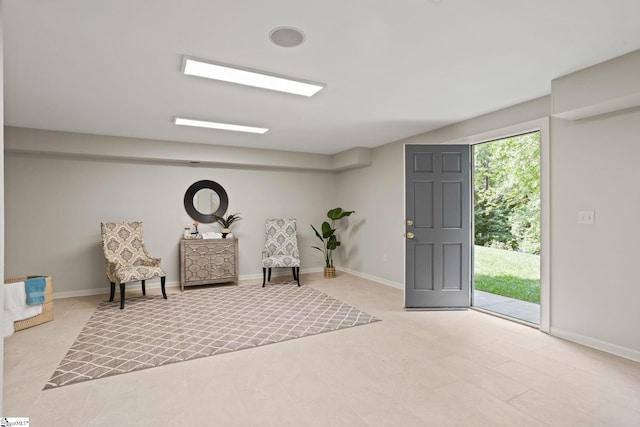 unfurnished room featuring baseboards