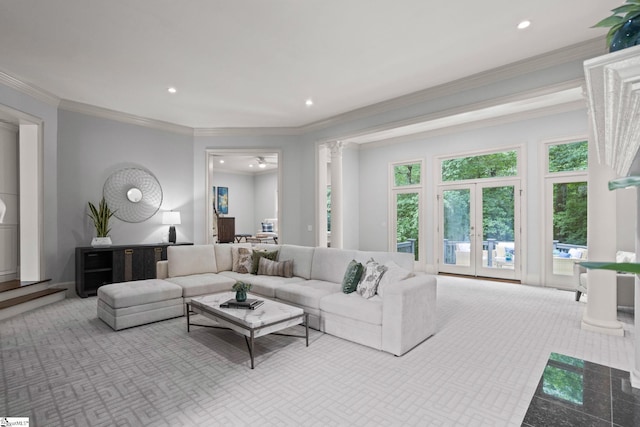 living room with carpet floors, ornamental molding, french doors, and recessed lighting