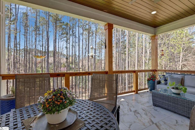 9 Graywood Ct, Simpsonville, SC 29680 - sunroom / solarium featuring outdoor dining area and a view of trees