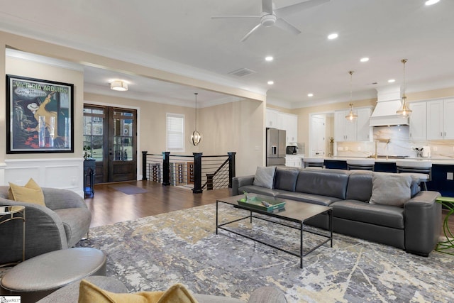 9 Graywood Ct, Simpsonville, SC 29680 - living area with ceiling fan, visible vents, crown molding, and dark wood finished floors