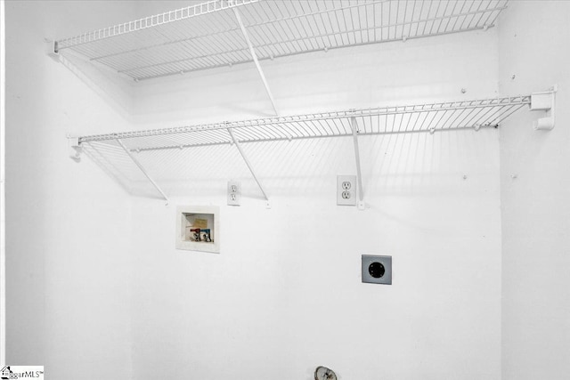 laundry room with laundry area, hookup for a washing machine, and electric dryer hookup