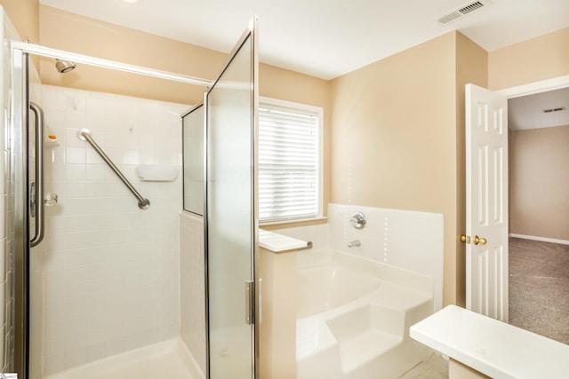 213 Lexington Place Way, Greenville, SC 29615 - bathroom with a bath, a stall shower, and visible vents