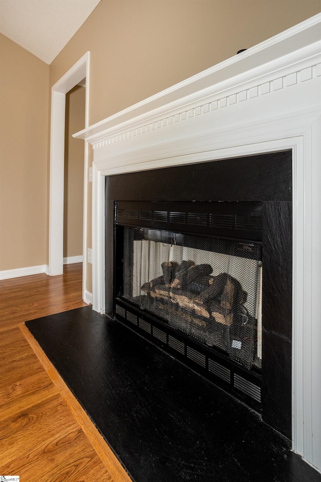 213 Lexington Place Way, Greenville, SC 29615 - interior details with baseboards and wood finished floors