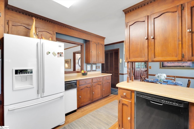 202 Mornington Ct, Simpsonville, SC 29681 - kitchen with light countertops, crown molding, white appliances, light wood finished floors, and brown cabinets