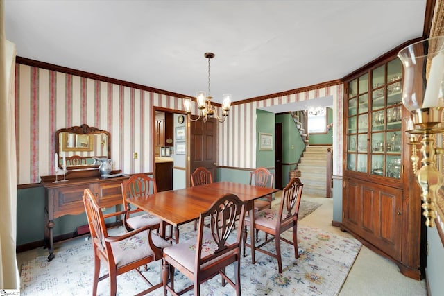 202 Mornington Ct, Simpsonville, SC 29681 - dining space with stairway, light colored carpet, ornamental molding, wallpapered walls, and a notable chandelier