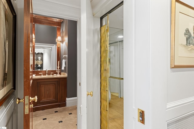 bathroom featuring tile patterned floors and vanity
