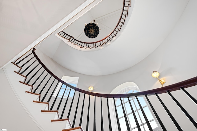 stairway featuring plenty of natural light