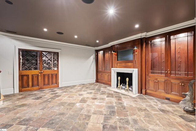 unfurnished living room featuring recessed lighting, ornamental molding, baseboards, stone finish flooring, and a fireplace
