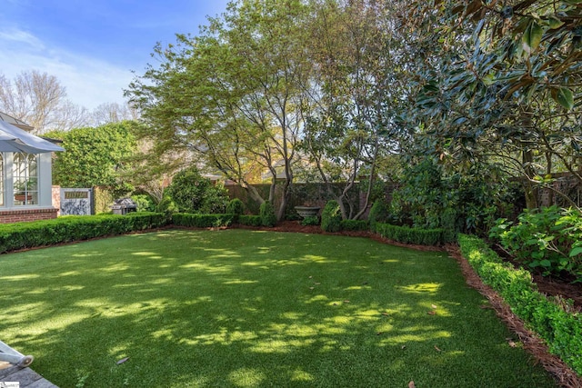 view of yard featuring fence