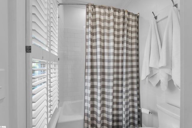 full bathroom with toilet, radiator heating unit, and shower / bathtub combination with curtain