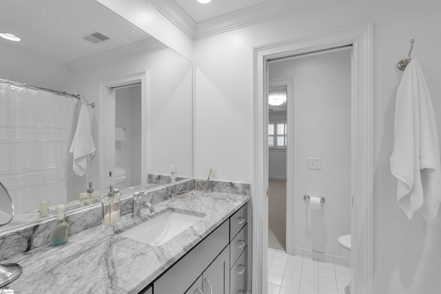 bathroom featuring toilet, crown molding, tile patterned flooring, and visible vents