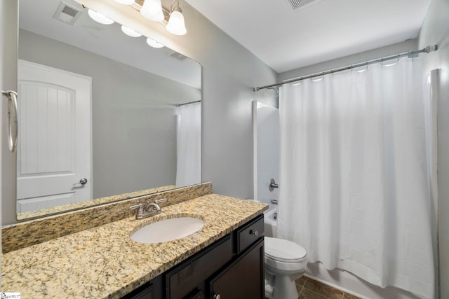 bathroom with vanity, shower / tub combo, toilet, tile patterned floors, and visible vents