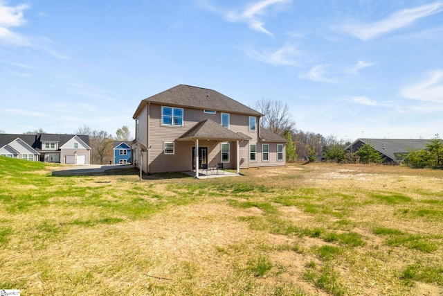 back of property featuring a patio area
