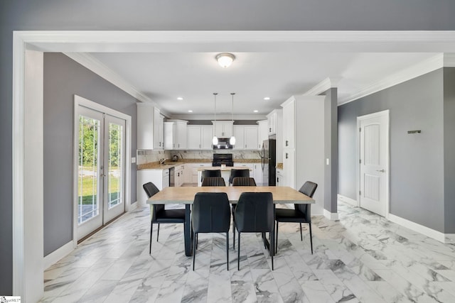 dining area featuring baseboards, marble finish floor, and crown molding