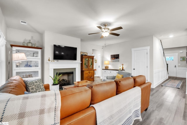 120 Marshfield Trl, Simpsonville, SC 29680 - living area featuring a ceiling fan, wood finished floors, and a fireplace