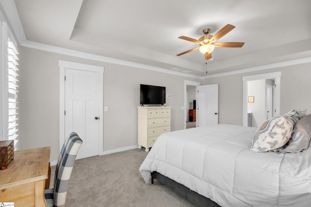 120 Marshfield Trl, Simpsonville, SC 29680 - bedroom featuring a tray ceiling, light carpet, connected bathroom, ceiling fan, and baseboards