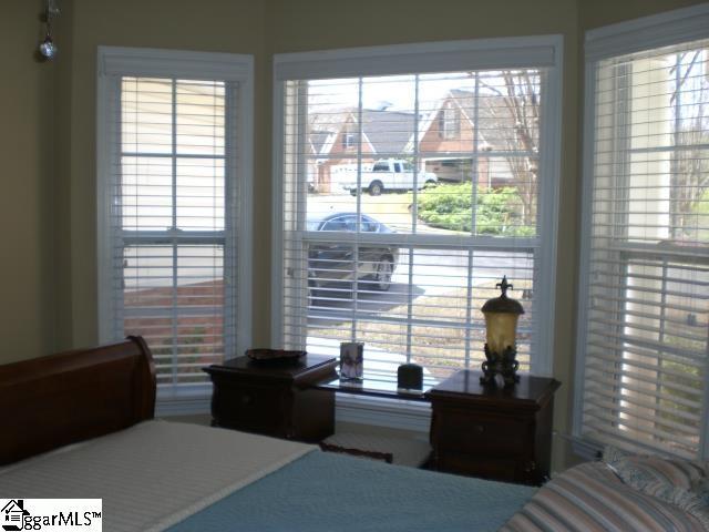 bedroom featuring multiple windows