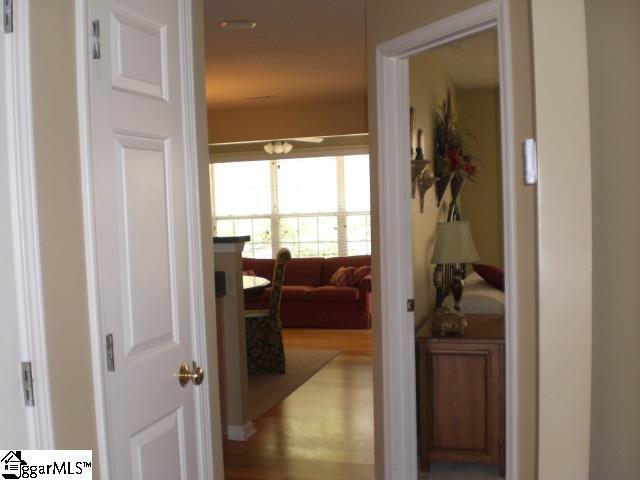 hallway featuring wood finished floors