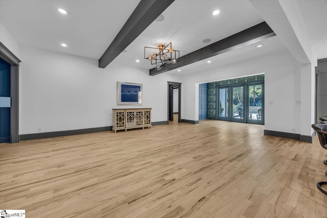 unfurnished living room with recessed lighting, baseboards, beamed ceiling, and wood finished floors