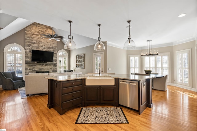 100 Breeds Hill Way, Greer, SC 29650 - kitchen featuring a sink, a fireplace, dishwasher, ceiling fan, and dark brown cabinets