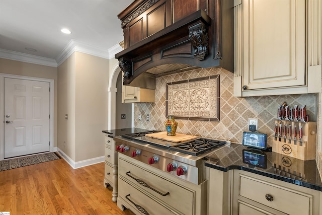 100 Breeds Hill Way, Greer, SC 29650 - kitchen with cream cabinets, stainless steel gas cooktop, custom exhaust hood, and crown molding