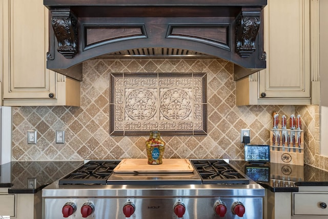 100 Breeds Hill Way, Greer, SC 29650 - kitchen featuring custom range hood, cream cabinetry, tasteful backsplash, and premium range