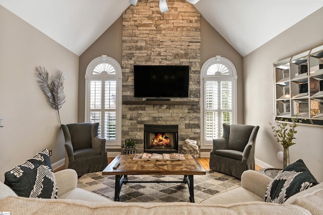 100 Breeds Hill Way, Greer, SC 29650 - living room with plenty of natural light, a stone fireplace, baseboards, and wood finished floors