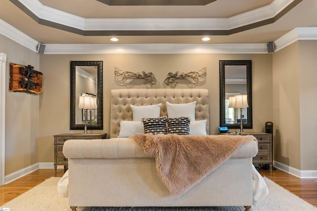 100 Breeds Hill Way, Greer, SC 29650 - bedroom featuring a tray ceiling, baseboards, and wood finished floors