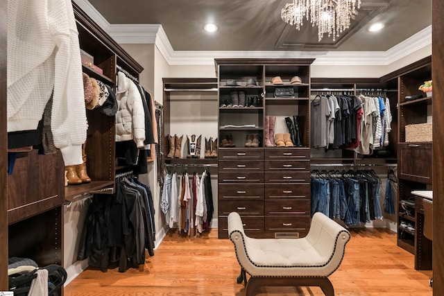 100 Breeds Hill Way, Greer, SC 29650 - spacious closet with light wood-style floors and a chandelier