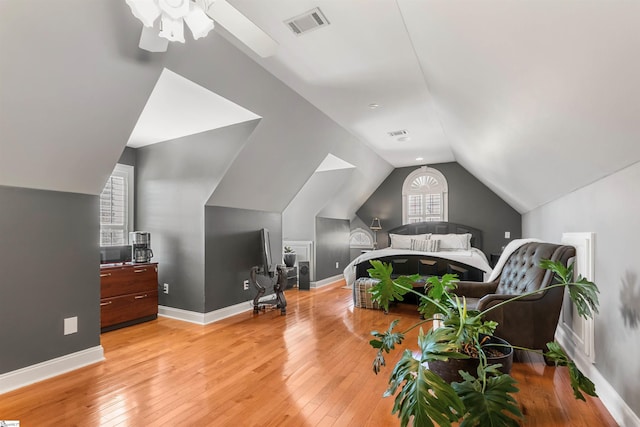 100 Breeds Hill Way, Greer, SC 29650 - bedroom featuring baseboards, visible vents, light wood-style floors, and vaulted ceiling