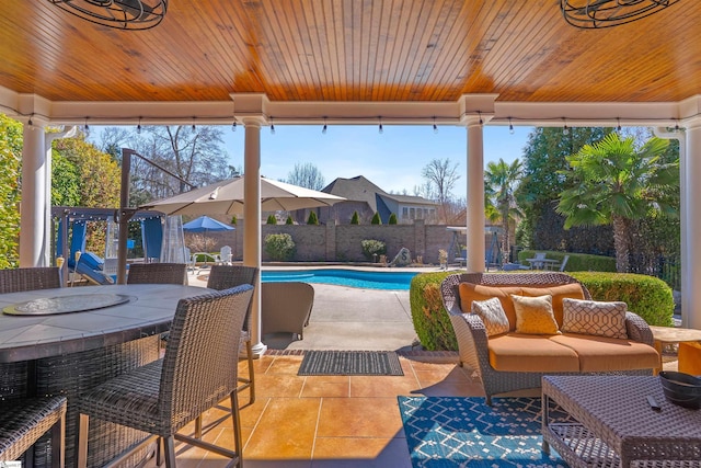 100 Breeds Hill Way, Greer, SC 29650 - view of patio featuring outdoor dining space, fence, and a fenced in pool
