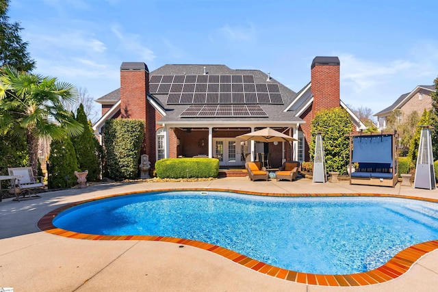 100 Breeds Hill Way, Greer, SC 29650 - outdoor pool featuring french doors and a patio