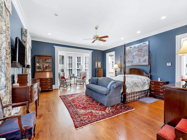 bedroom featuring a ceiling fan, recessed lighting, crown molding, and light wood-type flooring