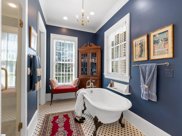 full bathroom with a soaking tub, a shower stall, baseboards, ornamental molding, and a notable chandelier