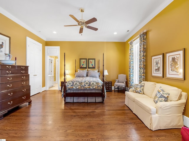 bedroom featuring crown molding, wood finished floors, and recessed lighting